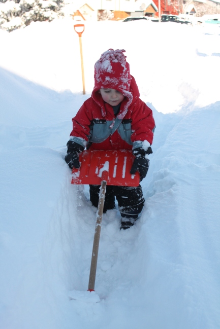 He loves to turn the shovel upside down and pretend to snowblow